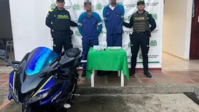 Photo of Capturan a dos hombres armados en moto con uniforme de empresa nacional de bebidas en San Juan Nepomuceno
